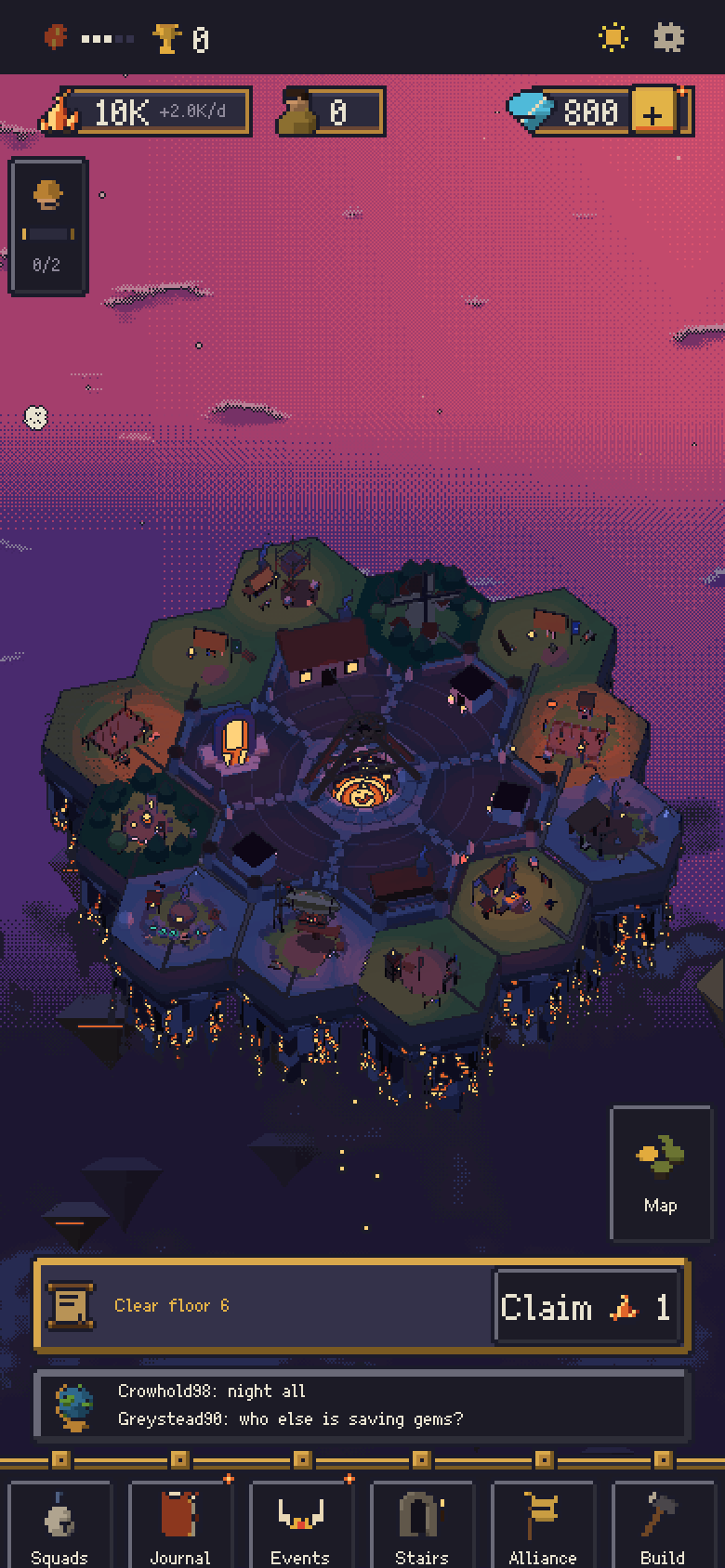 The colony at dusk on the game's main screen: an island of hex tiles built up, its lights on, a pink sky behind it